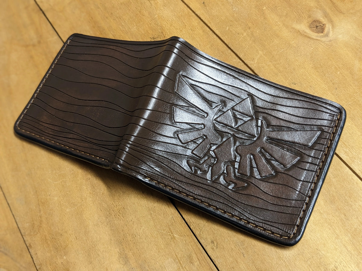 Handcrafted leather Zelda wallet showing full exterior tooling, designed by Theodoros artisans and free shipping worldwide.