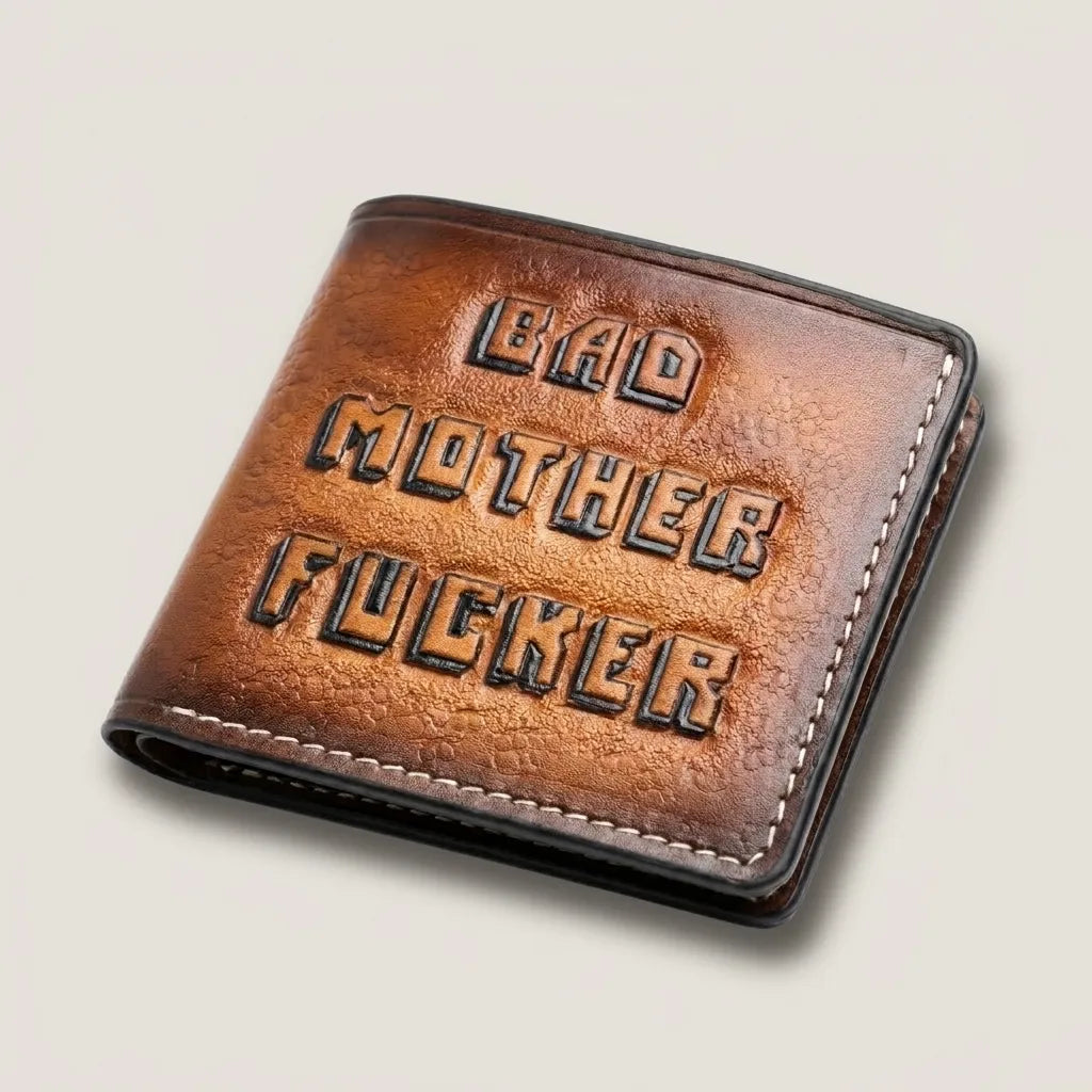 Handmade full grain leather bifold wallet with “Bad Mother F*cker” engraved design