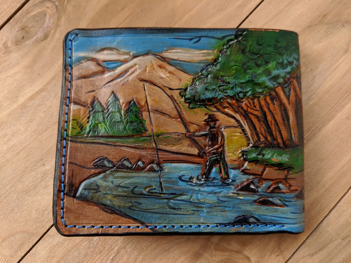 Embossed bifold leather wallet featuring bass fishing design