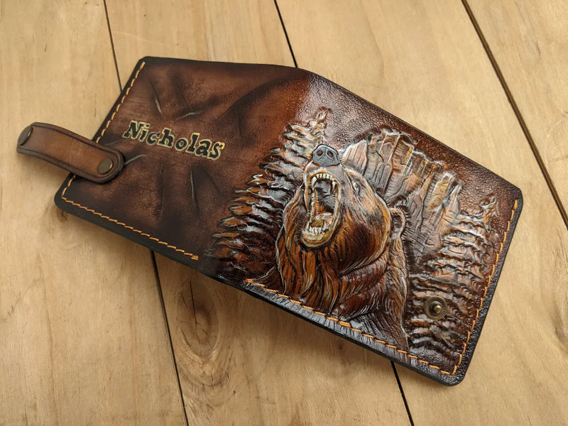 Embossed grizzly bear on handcrafted leather bifold wallet