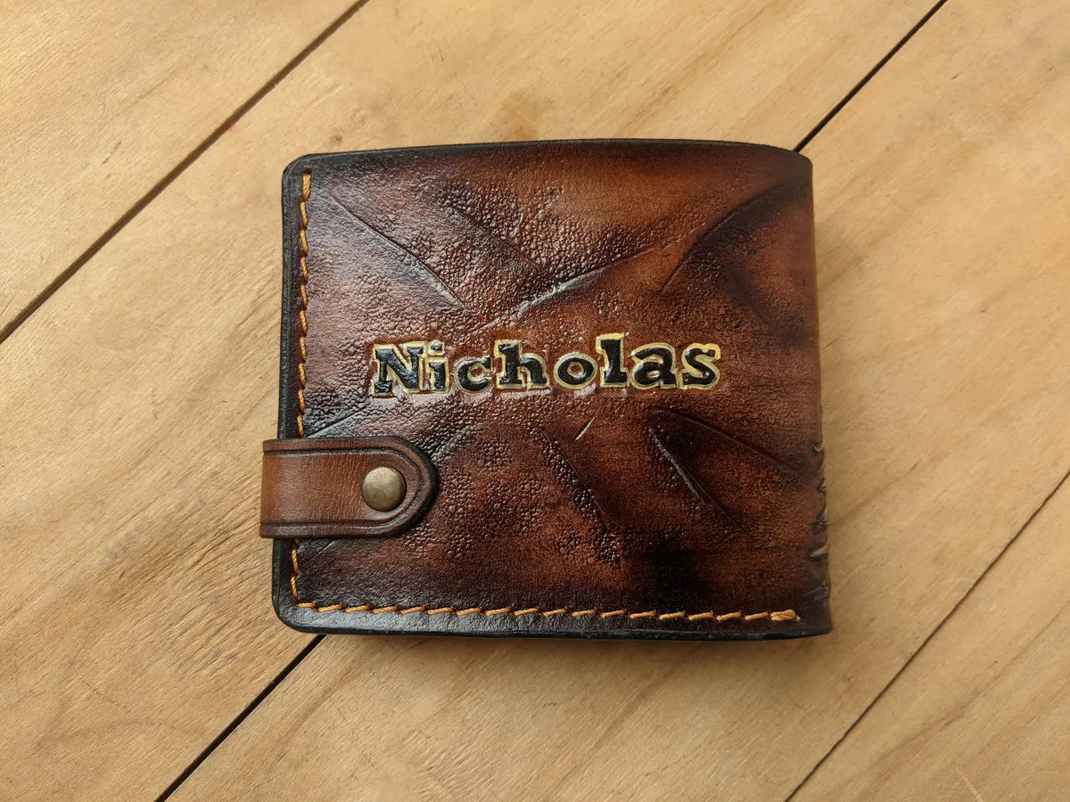 Artisan leather wallet with deep embossed grizzly bear motif
