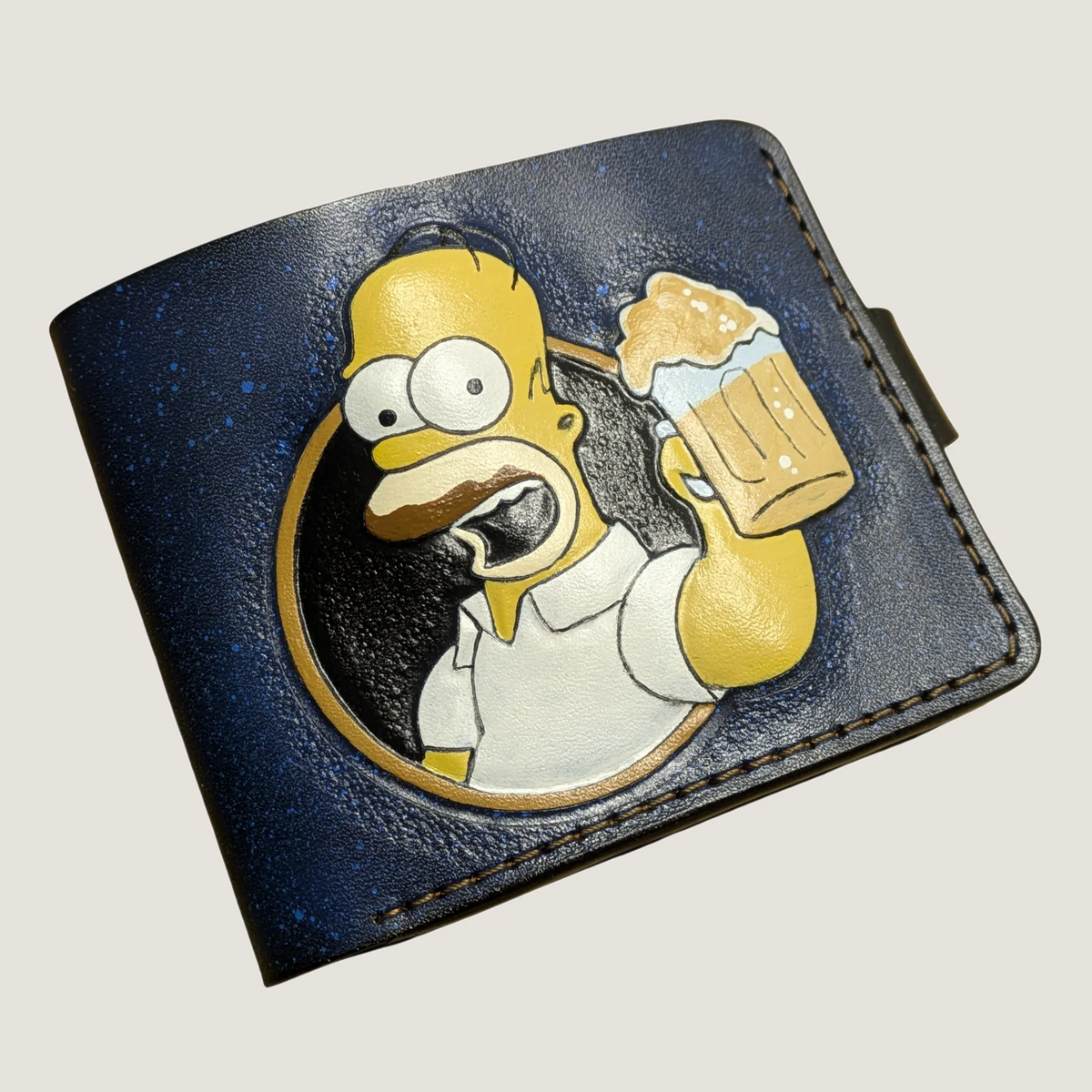 Hand-tooled Homer Simpson leather wallet with Duff beer mug, hand-painted on blue full-grain vegetable-tanned leather.