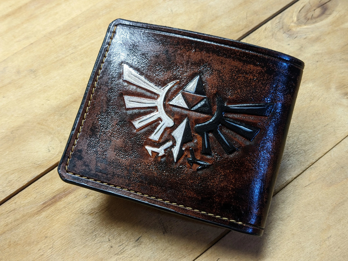 Hand-carved leather Hylian Crest wallet for men, an ideal anniversary or birthday gift for LOZ gaming fans in United States.