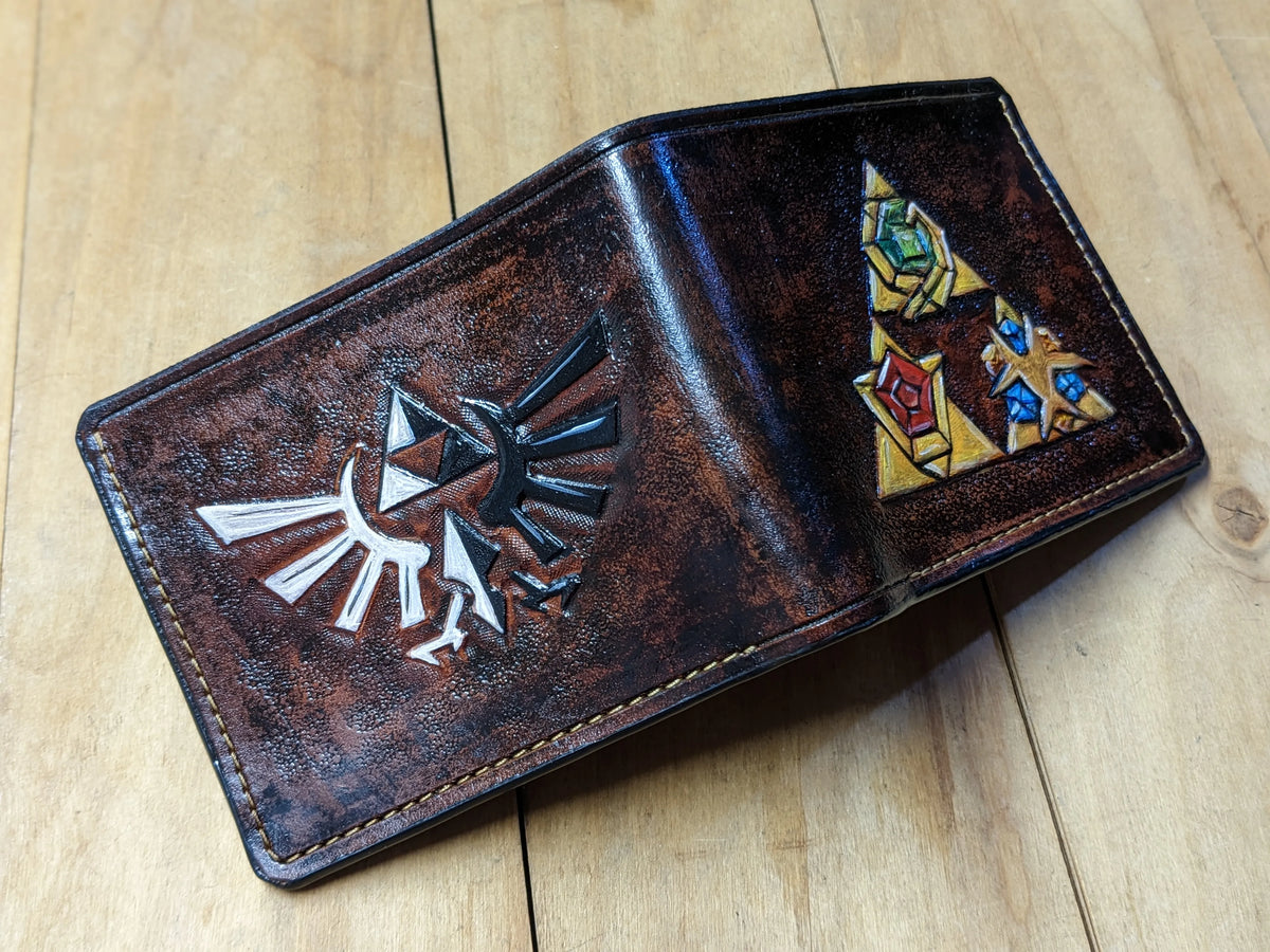 Premium collector's edition Zelda leather wallet styled in a complete Nintendo Switch gaming setup, perfect geek culture gift.