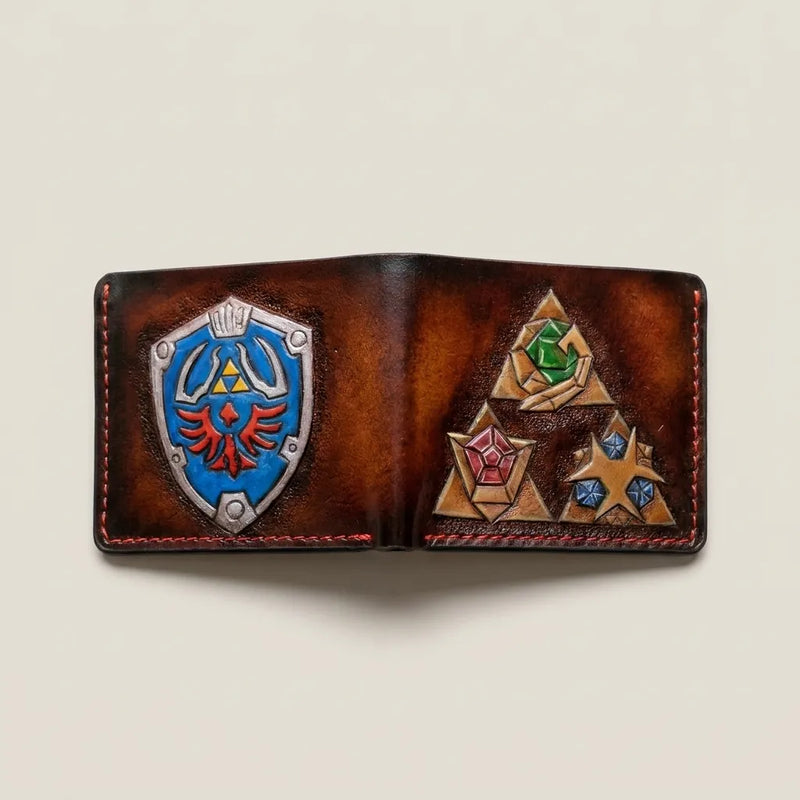 Custom carved full-grain leather Zelda Hylian Shield wallet featuring a Spiritual Stones design, handmade by Theodoros Leather.
